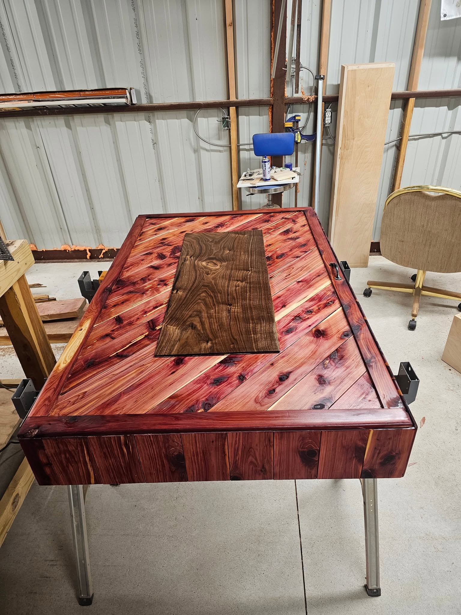 Cedar table top with a walnut inlay panel, in progress in the shop